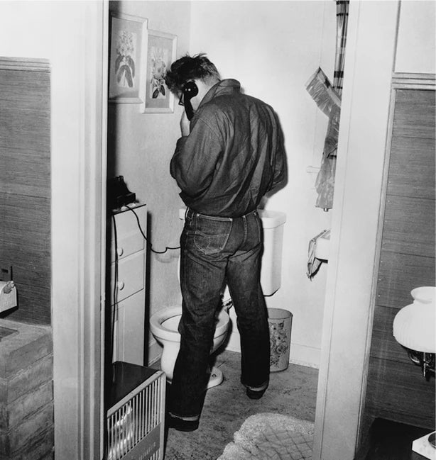 Print of James Dean using the Restroom by Frank Worth
